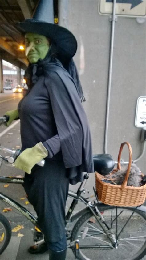 Maleficent witch riding a bike